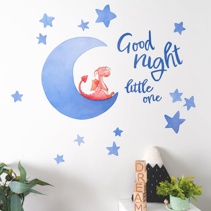 Children's wall decals made up of stars and a moon with a dragon sat on it with the words good night little one next to it