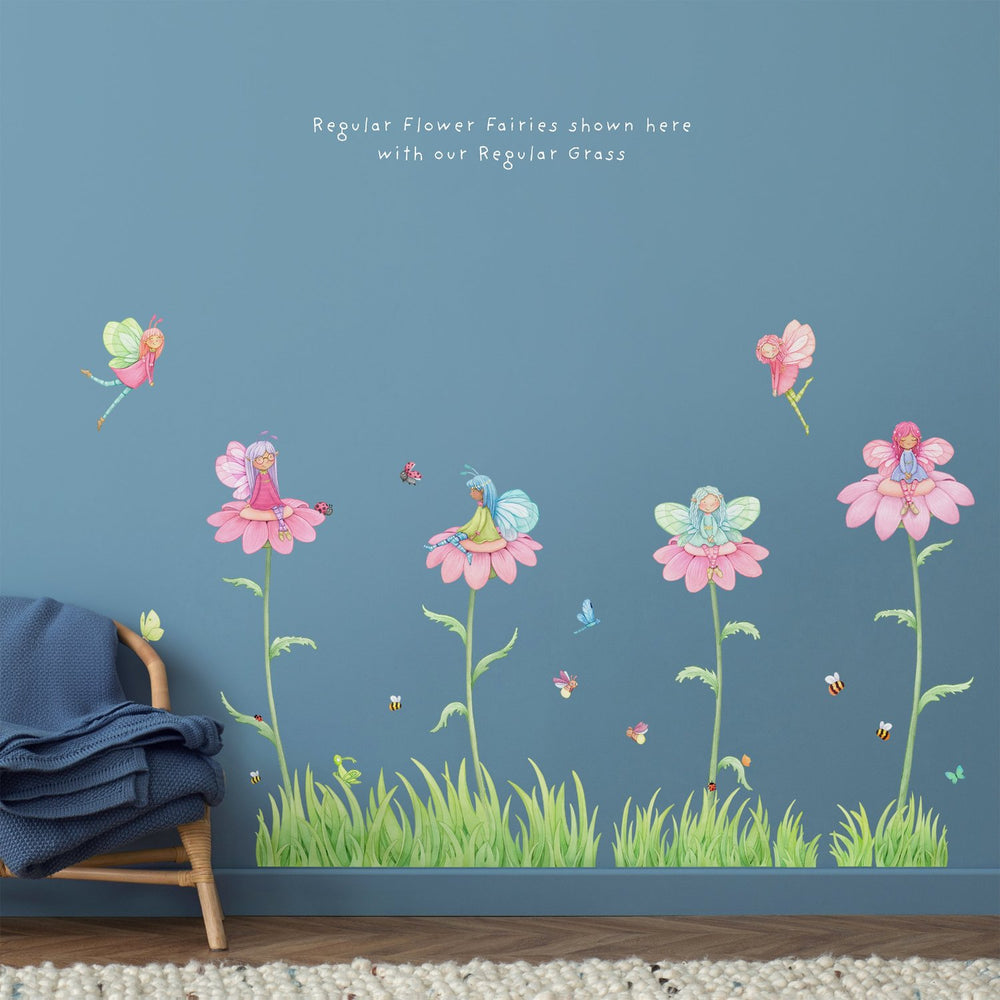 A kids room with dark blue walls and high quality fairy wall stickers