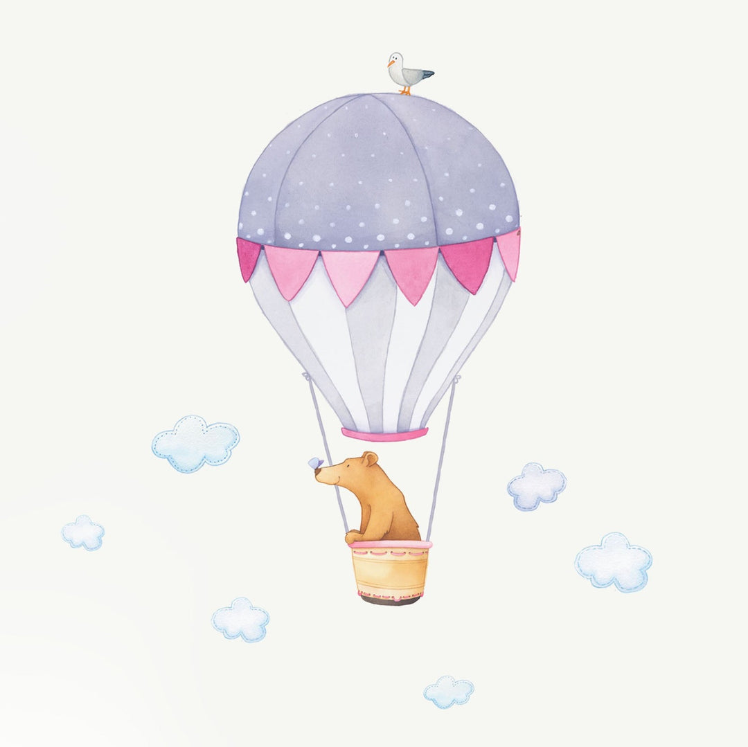 A brown bear in a pink hot air balloon wall decal for kids